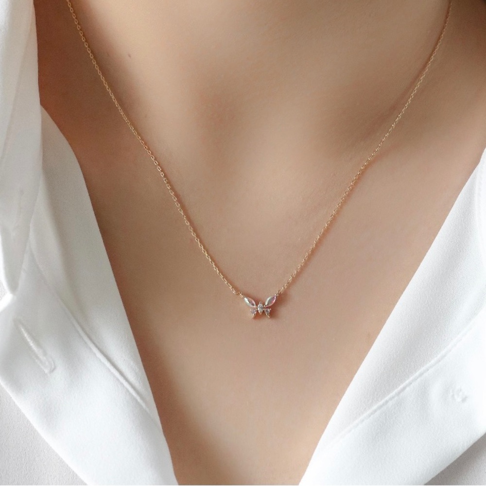 Minimalist Iridescent butterfly pendant. Only $45. Please share listing
